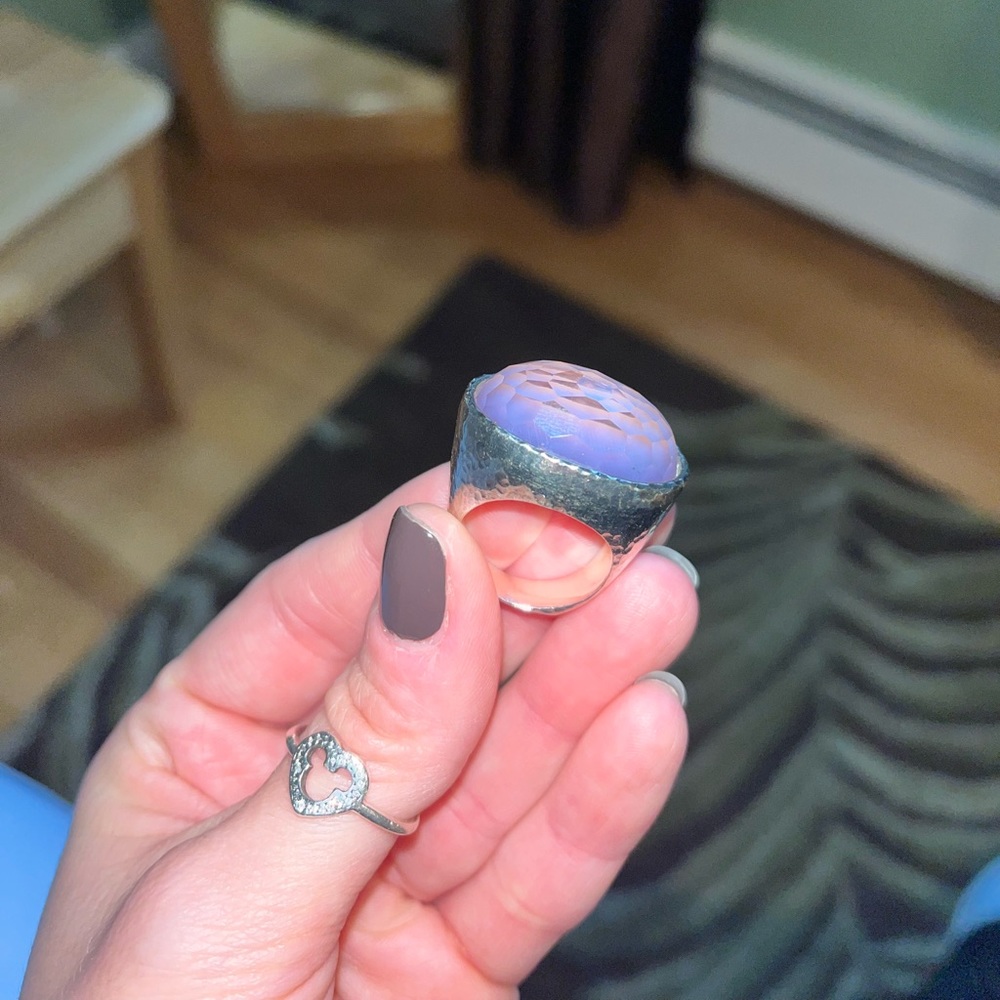 Ippolita sterling silver cocktail ring with very light purple stone.